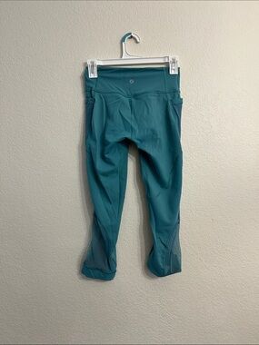 lululemon athletica Teal Cropped Performance Leggings with Mesh Panels